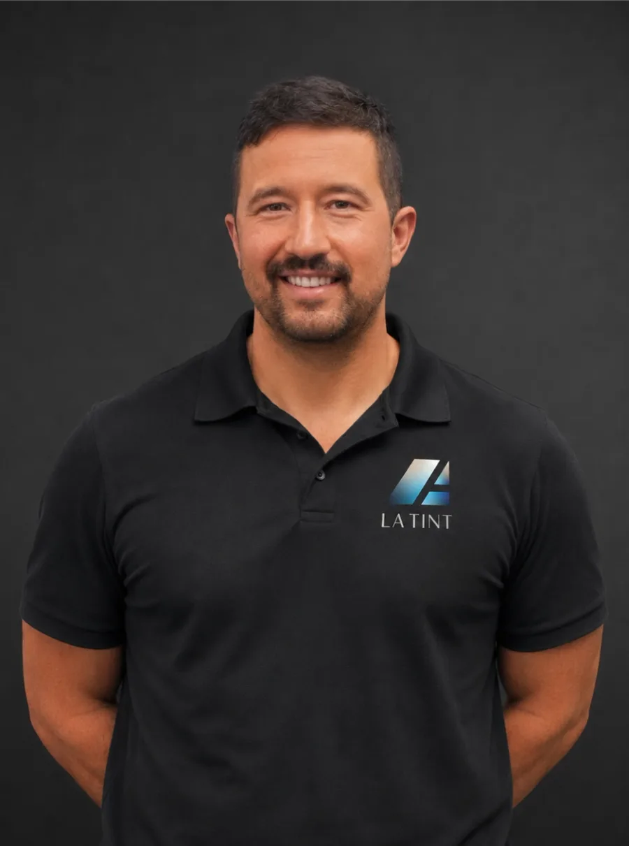 Luke Addis, owner of LA Tint, in a black LA Tint polo shirt